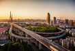 © Miss Rein/Stocksy - The Yangpu bridge at sunset,the one of landmark in shanghai,china
