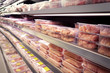 Shelves with fresh meat in supermarket