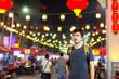 Foreigner in a Chinatown at the gate