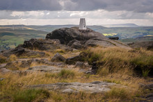 Blackstone Edge Is A Gritstone Escarpment At 1,549 Feet Above Sea Level In The Pennine Hills Surrounded By Moorland On The Boundary Between Greater Manchester And West Yorkshire In England.