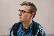 Side Profile Portrait Of Young Man In City