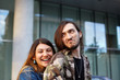 © shurkin_son - Romantic beautiful young couple relaxing outdoors. Cheerful cute girl with nose-ring laughing and embracing her stylish boyfriend in camouflage jacket. Love, dating, romance and relationships