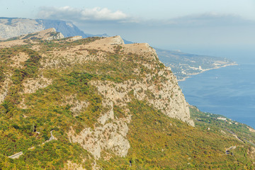 Mountain landscape. Mountain top and the sea. On the top. The background with the expanses of the sea and the mountains. Rest on the sea. Journey. Crimea.