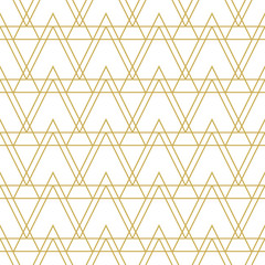 Geometric triangular art deco style scales in gold. Seamless vector pattern