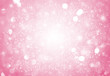 © narongchaihlaw - Soft Pink sparkle rays lights with bokeh elegant abstract background. Dust sparks in explosion background. Vintage or retro.