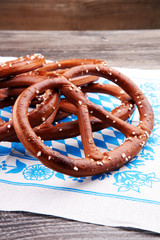 Wall Mural - Pretzel. Beer snacks on wooden table. Bavarian oktoberfest pretz