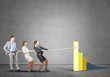 © adam121 - Businessteam working in collaboration pulling graph with rope as symbol of power and control