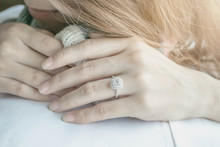 Close Up Diamond Ring On Woman's Finger With Vintage Tone.(soft And Selective Focus)
