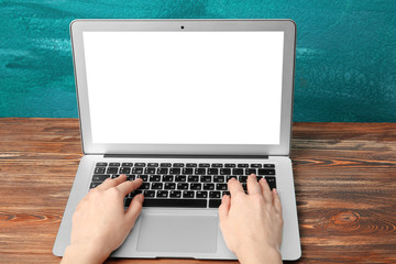 Sticker - Young woman working with laptop at table