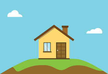 small flat house on top off hill with blue sky background