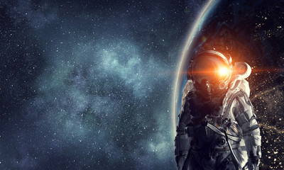 Wall Mural - astronaut explorer in space. mixed media