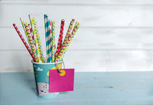 Colorful Paper Cup With Empty Label And  Striped Straws For Birthday Party