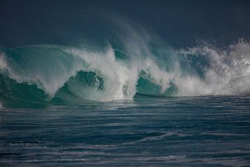 Wall Mural - huge waves crashing in ocean. seascape environment background. water texture with foam and splashes.
