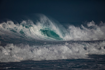 Wall Mural - huge waves crashing in ocean. seascape environment background. water texture with foam and splashes.