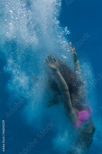 Drowning Girl In Pink Bikini A Swimmer After Jump Underwater