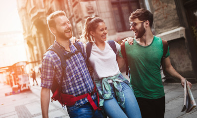 Wall Mural - Happy group of tourists traveling and sightseeing