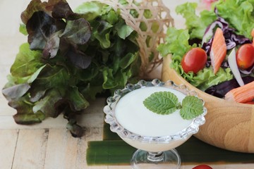 Canvas Print - Salad of fresh vegetables with dressing delicious