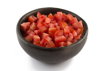 Wall Mural - Diced tomatoes into a bowl