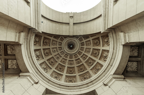 Vaulted Ceiling With Central Lamp In A Neoclassical Building Seen
