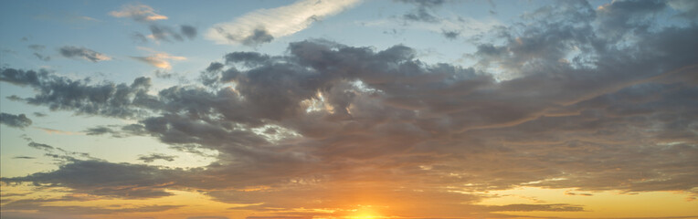 Wall Mural - fiery sunset, colorful clouds in the sky