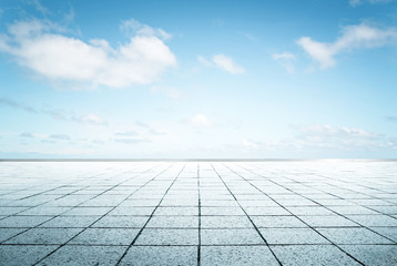 Wall Mural - Empty  floor in front of blue sky .