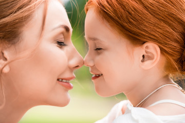 beautiful happy mother and daughter