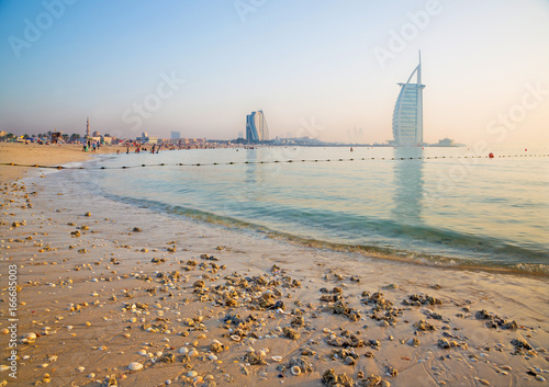 Cuadros en Lienzo DUBAI, UAE - MARCH 30, 2017: The evening skyline with the Burj al Arab and Jumeirah Beach Hotels and the open Jumeriah beach