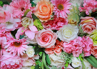 Wall Mural - Artificial bouquet flowers background.