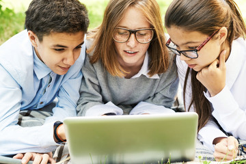 Wall Mural - Group of Children Browsing Internet Outdoors