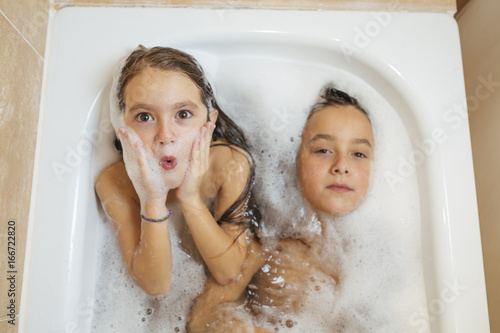 boy and girl bathing