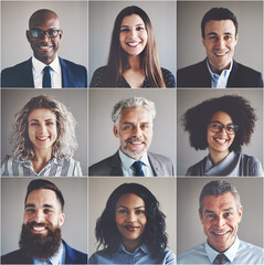 smiling group of ethnically diverse professional businessmen and