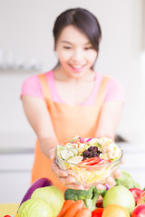 Poster - beauty housewife in kitchen