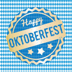 Oktoberfest rubber stamp gold on a checkered background.