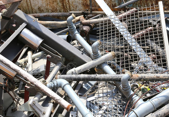 material and old iron pipes in the landfill of recyclable materi