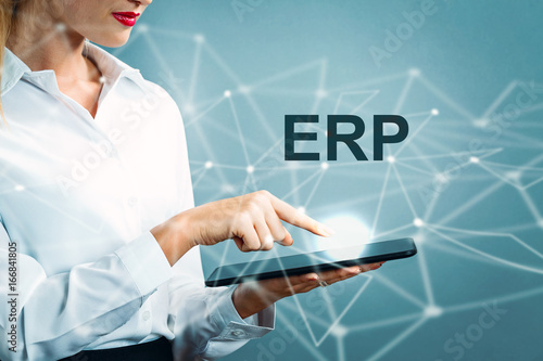 Fotografie, Obraz ERP text with business woman using a tablet