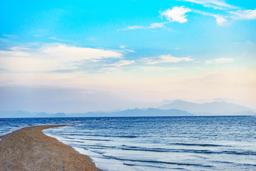 The sand in the middle,The waves of the sea, two side.