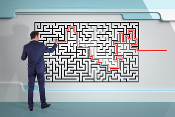 Poster - Businessman searching maze solution on a wall 3D rendering