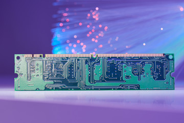 Computer RAM Memory Chip Data Concept  On Background With Fiber Optics And Reflections On White  Lighted 

Table