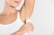 © Africa Studio - Beautiful young woman with deodorant on light background