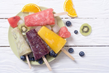 Wall Mural - Popsicle with fruits