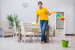 © Elnur - Young man doing chores at home