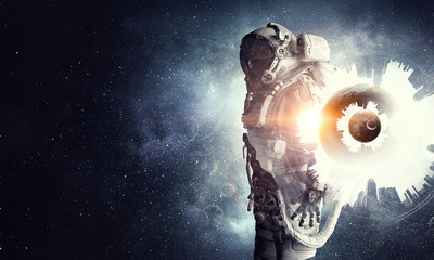 Wall Mural - astronaut in fantasy world. mixed media