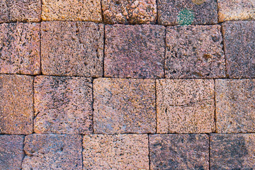 Wall Mural - Details of laterite wall stone, background and texture