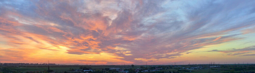 Dramatic sunset over city