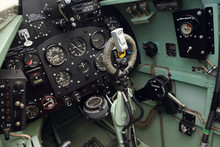 Morecambe, England, 02/05/2016, The Cockpit And Controls Inside A World War Two Spitfire British War Plane. Thruster, Fuel Dials And Direction Control.