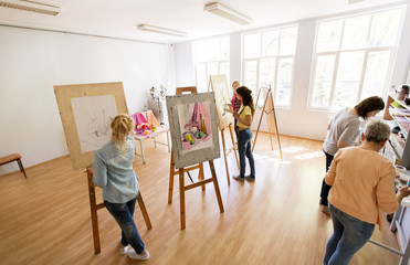 Wall Mural - woman artists with brushes painting at art school