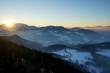 Sonnenuntergang in Winterlandschaft in den Bergen