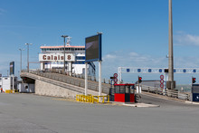 Ferry To England Moored At Harbor Gate In Calais, France