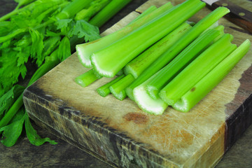 Wall Mural - Fresh green celery isolated on white background