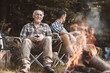 © gpointstudio - Camp with bonfire in woodland